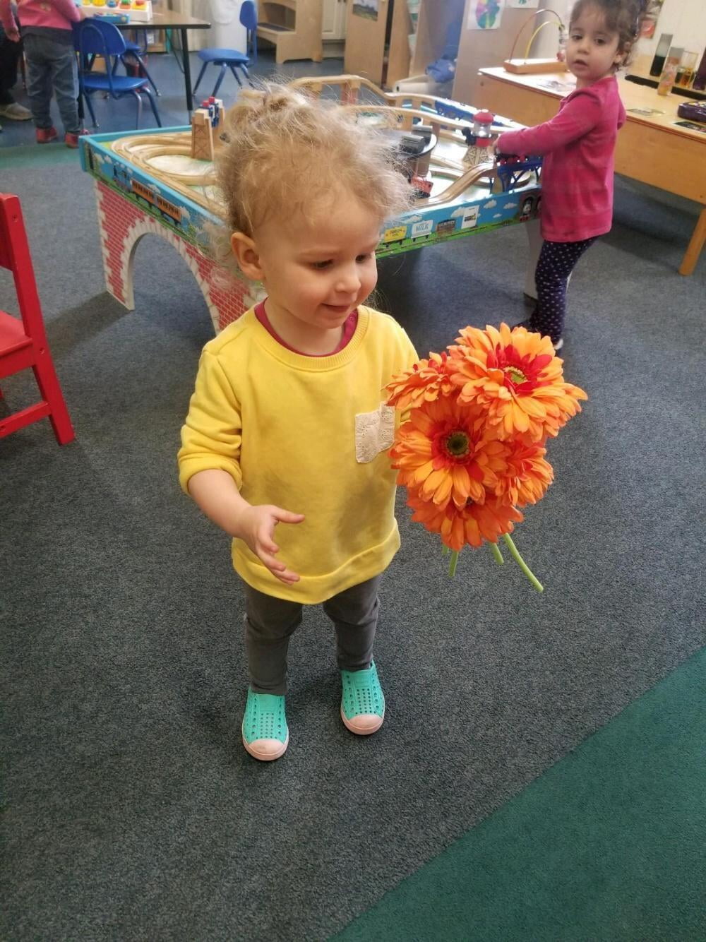 Child with flower